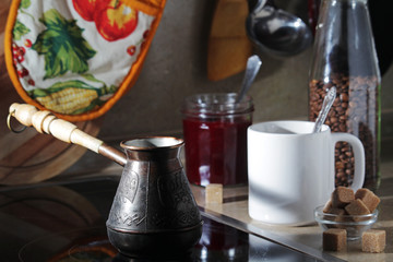 Morning still life with a coffee pot and a mug	