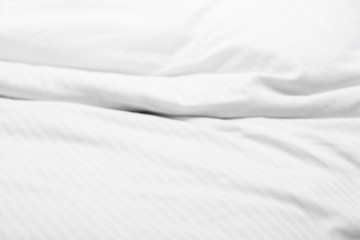 White delicate soft background of fabric or bedding sheet