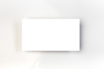 blank business cards on white background with copy space.