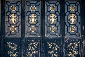 Golden lacquered wood carving flower door of the ancient architectural courtyard of Zumiaoling, Foshan, Guangdong, China