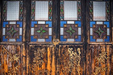 Chinese ancient building's door, sea bream pattern, stained glass door