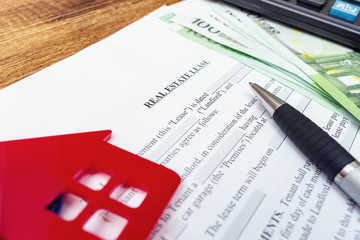 House, home, property, real estate lease rental contract agreement pen money coins keys wooden background, expenses, buying, investment, finance, savings, concept close up selective focus