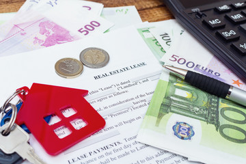 House, home, property, real estate lease rental contract agreement pen money coins keys wooden background, expenses, buying, investment, finance, savings, concept close up selective focus