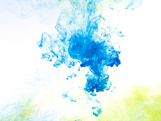Poster color in water. Abstract background.