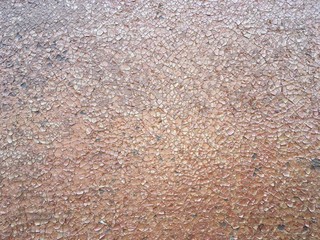 Fototapeta premium old rural building material with cracked paint on fabric