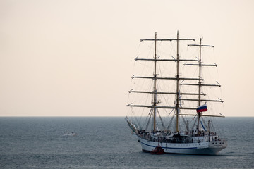 Fototapeta na wymiar Sailing training ship Khersones. Black Sea. The Coast Of Sochi. Yachts and ships at sea.
