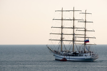 Fototapeta na wymiar Sailing training ship Khersones. Black Sea. The Coast Of Sochi. Yachts and ships at sea.