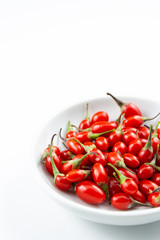 fresh goji berries isolated on white copy space