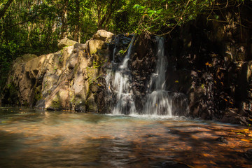 Fototapeta premium Ton Aow Yon Waterfall rich natural resources,in the forest,asia tropical areaat Island Phuket Thailand.