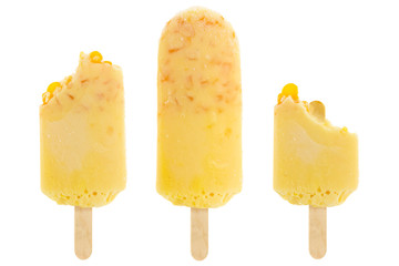 set of bitten yellow corn popsicle isolated on white background