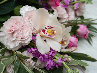 Wedding bouquet of orchids,matiolli, carnations, beautiful delicate flowers.