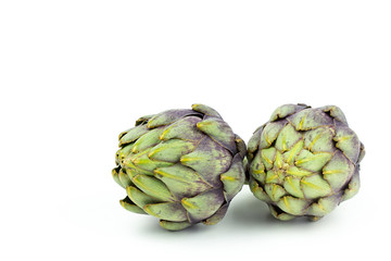 Obraz premium globe artichokes isolated on white copy space