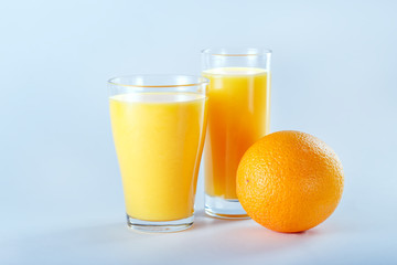 Fresh orange juice with fruits, isolated.