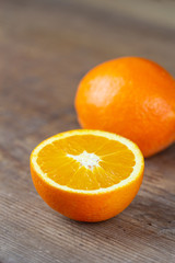 orange fruits isolated on wooden board copy space