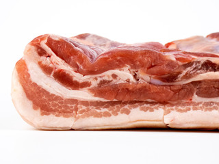 raw pork belly isolated on white copyspace closeup