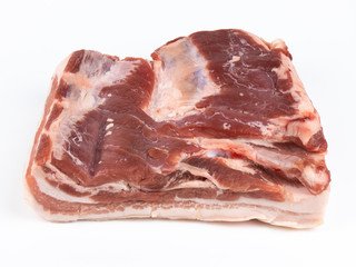 raw pork belly isolated on white copyspace closeup