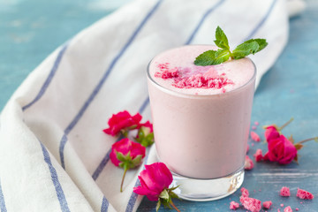 Close up of fruit yougurt smoothie - health living concept