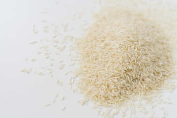 Pile of white rice isolated on white background