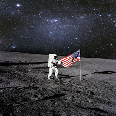 American astronaut landed and set his national flag on the plane.t. Elements of this image...