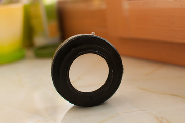 Metal lens adaptor for camera on the surface