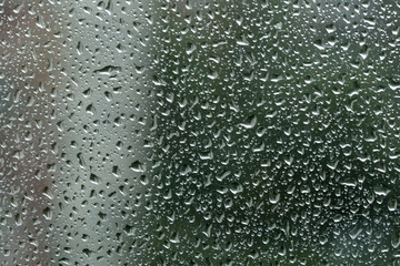 Drops of rain on a window. Abstract background.