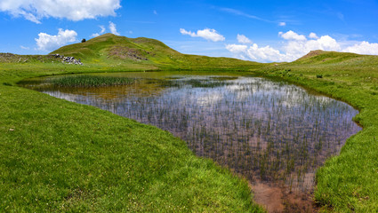 View of the so-called Dragon Lake or Drakolimni near the summit of Mount Smolikas in Epirus, Greece