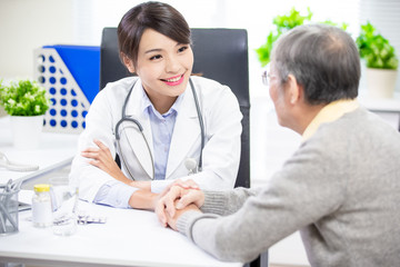 Female doctor see elder patient