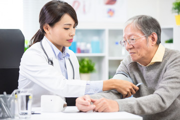 Doctor measure blood pressure