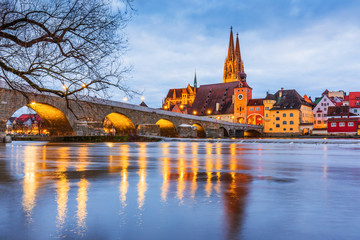 Regensburg, Germany. View from Danube of Regensburg Cathedral and Stone Bridge. - obrazy, fototapety, plakaty