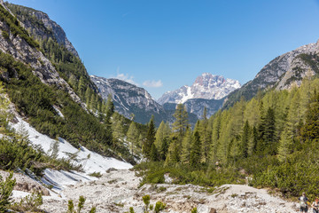 Fototapeta na wymiar Rienza valley hiking way to go to The Three Peaks of Lavaredo (Tre Cime di Lavaredo)