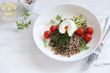 Quinoa with green asparagus, Poached Egg and grilled tomatoes. 