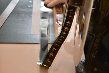 Obraz premium Checking on 35 mm. motion film