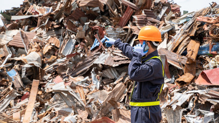 Manufacture worker check recycled plastic product the waste recycling plant,Recycling is processing used materials.
