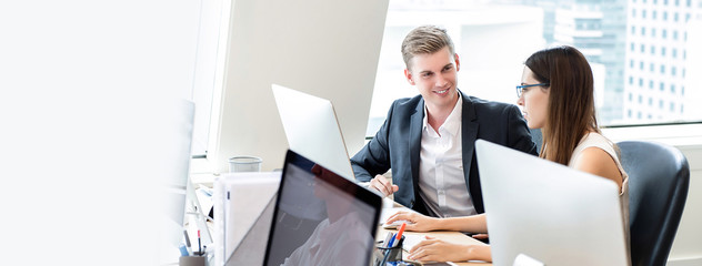 Happy business people coworkers working in office