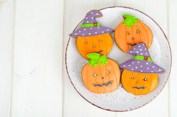 Bright Halloween pumpkin shaped gingerbread cookies.