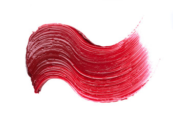 Smear and texture of red lipstick or acrylic paint isolated on white background.