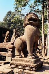 Fototapeta premium Sculpture of statue of lion in Cambodia. Angkor Wat is the largest religious monument in the world and a World heritage listed complex
