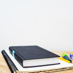 Close-up textbook on notepad