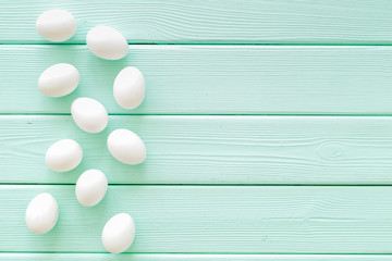 Farm products design for blog with eggs on mint green wooden background top view space for text