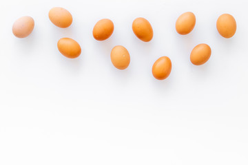 Blog pattern with eggs on white background top view copyspace