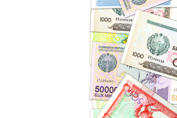 some Uzbek Som banknotes indicating growing economy with copyspace