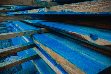 Fototapeta na wymiar blue boards lying on top of each other. building construction concept