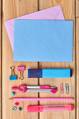 Stationery supplies and blank paper sheets. Back to school concept. Flat lay, top view.