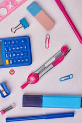 Assorted school supplies, top view. Stationery items background. Concept of education.