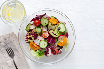 Fresh salad with vegetables. Healthy food concept.