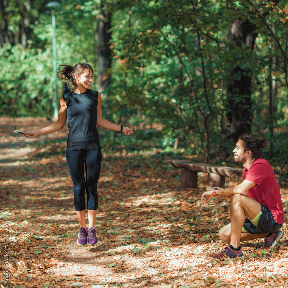 Wall mural Friends Exercising Outdoors Together