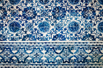 traditional portuguese azulejos, typical tin glazed white and blue ceramic tiles used to decorate walls, churches and palaces