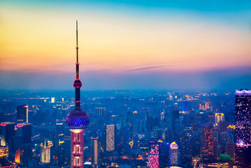Aerial cityscape of Shanghai at sunset. Panoramic view of Shanghai, China skyline from the...