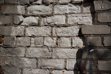 old burnt dilapidated brick wall