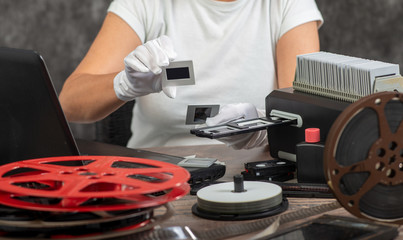 hand photographer digitize film slide for saving